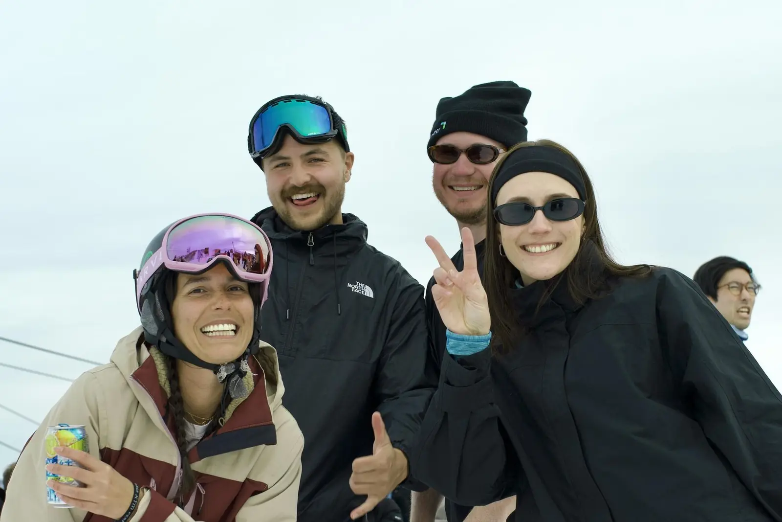 Four riders together on the mountain at Party Peak