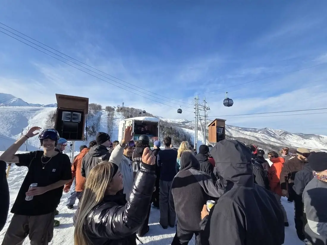 Filming the crowd on a bluebird day under the gondola