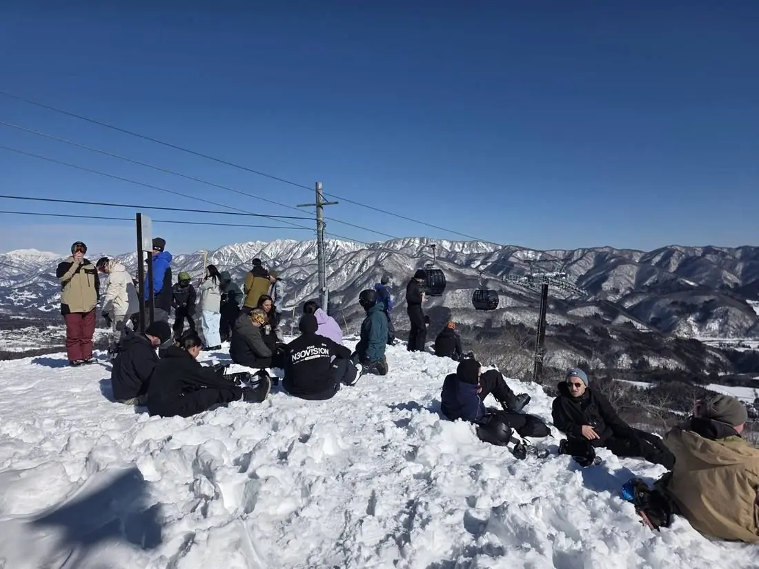 Sitting out on the snowbank looking across the Hakuba valley