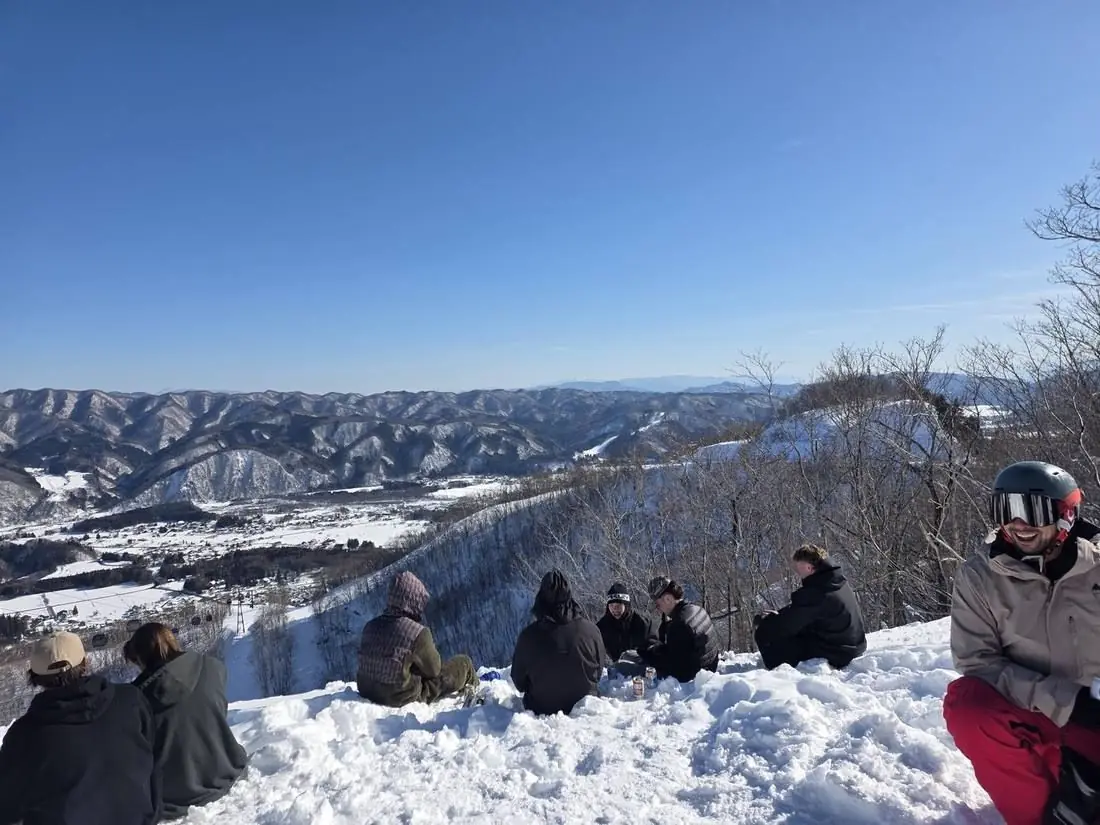 People sitting out over the Hakuba valley panorama